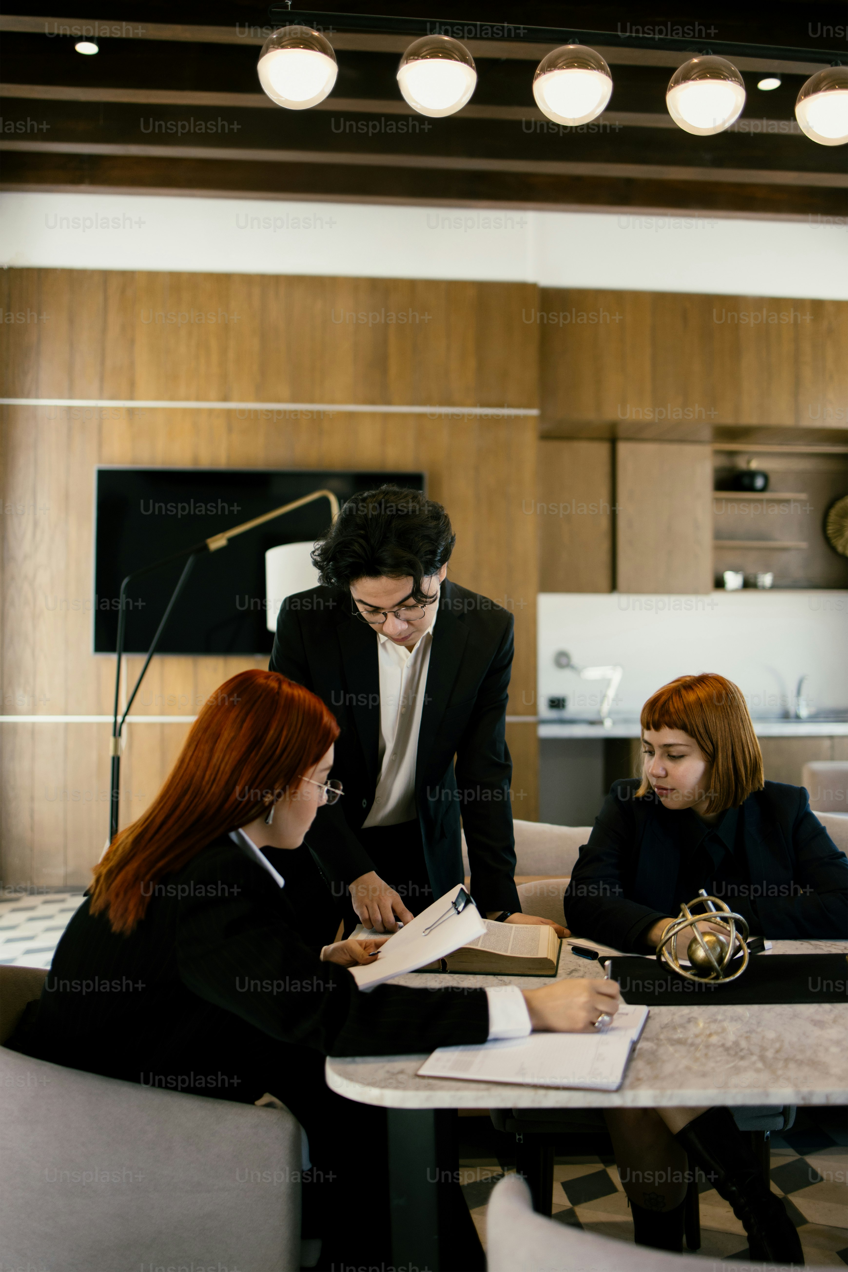 Business people are working together in an office.